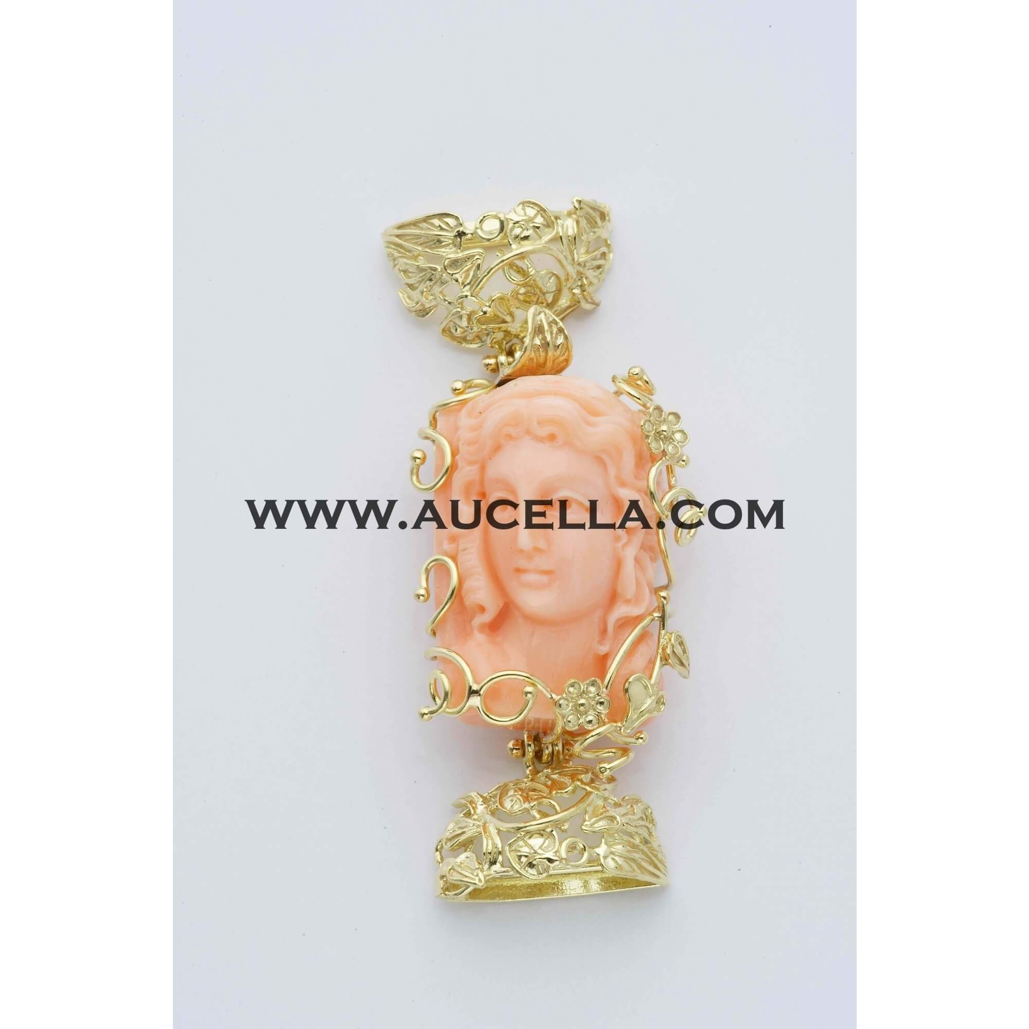 Clasp with coral carving set in gold 